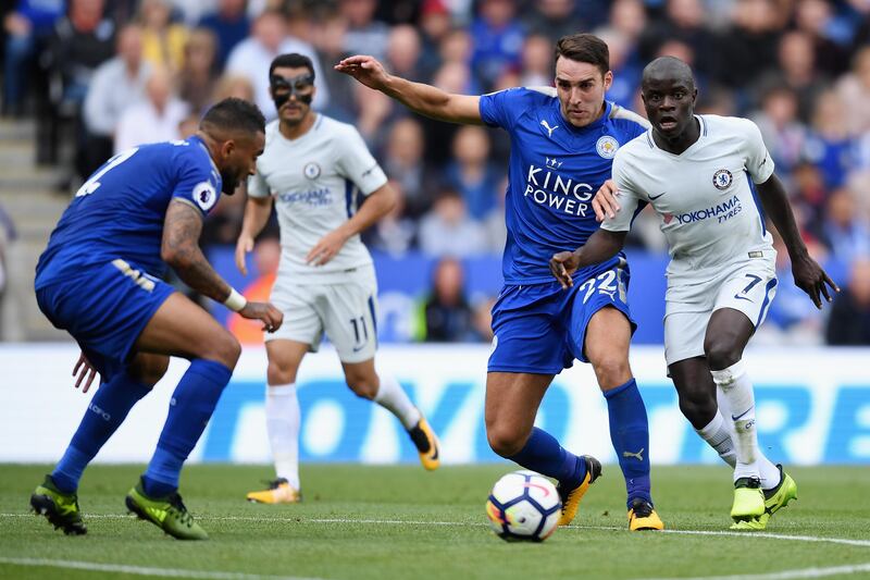 Matty James of Leicester and N'Golo Kante of Chelsea battle for possession. Michael Regan / Getty Images