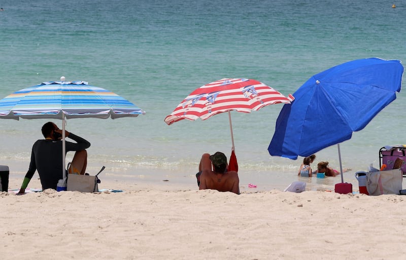 Dubai, United Arab Emirates - Reporter: N/A: News. The public beach next to the Burj Al Arab is busy as beaches in Dubai re open for the second day. Saturday, May 30th, 2020. Dubai. Chris Whiteoak / The National