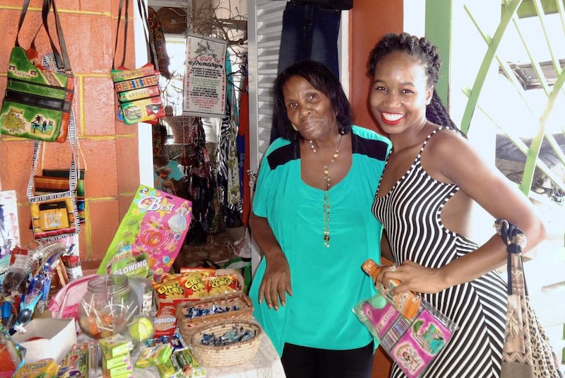 Christine Souffrant, right, with a street vendor in Antiqua. Courtesy Christine Souffrant