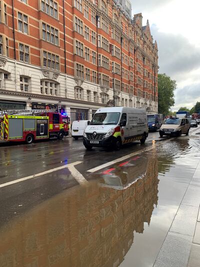 Flooding in Knightsbridge after 26 mm of rain fell in the space of an hour. Laura O'Callaghan / The National