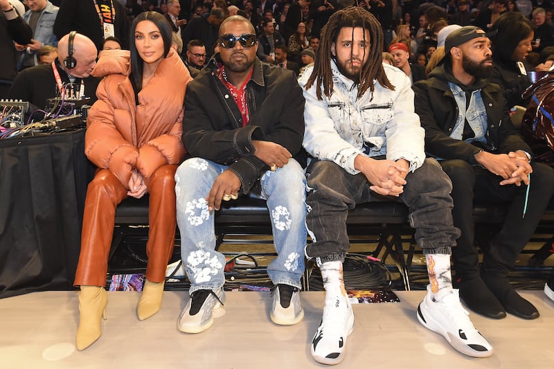 Kim Kardashian and Rappers, Kanye West and J Cole attend the 69th NBA All-Star Game as part of 2020 NBA All-Star Weekend on February 16, 2020 at United Center in Chicago, Illinois. AFP