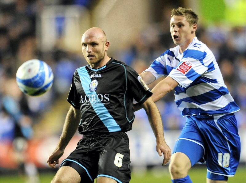 Leicester City's Wayne Brown and Reading's Simon Church (right) during the Coca-Cola Championship match at the Madejski Stadium, Reading.   (Photo by Anthony Devlin/PA Images via Getty Images)