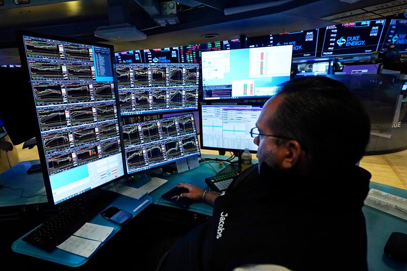 A trader on the floor of the New York Stock Exchange. Markets assumed the US Federal Reserve would not start to increase interest rates until 2024. AP Photo / Richard Drew