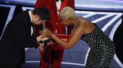 Japanese director Ryusuke Hamaguchi reacts as Tiffany Haddish presents the Oscar for Best International Feature Film. EPA