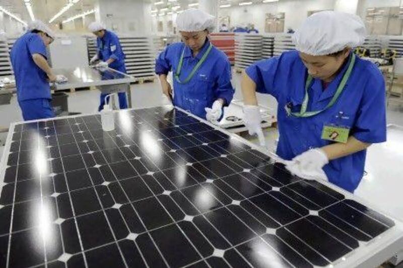 The China Solar factory in Hangzhou. Dubai hopes to issue green sukuk to finance solar parks, biogas plants and energy efficiency devices for homes. Lang Lang / Reuters