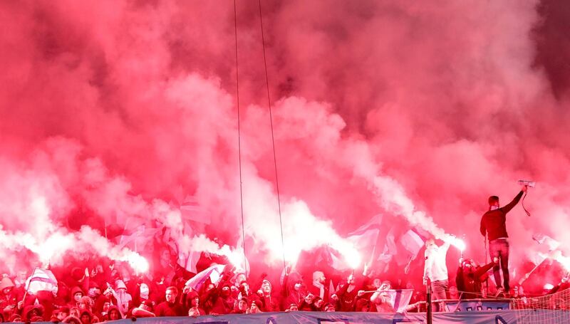 Malmo fans with flares before their Europa League match with Chelsea. Reuters