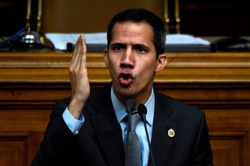 Venezuelan opposition leader and self-proclaimed acting president Juan Guaido gestures as she speaks during a session of the Venezuelan National Assembly in Caracas on March 6, 2019. Sanctions have worsened Venezuela's crippling economic and political crisis, the UN human rights chief said Wednesday, as Washington warned it may expand measures targeting President Nicolas Maduro's socialist government. / AFP / Federico Parra                      
