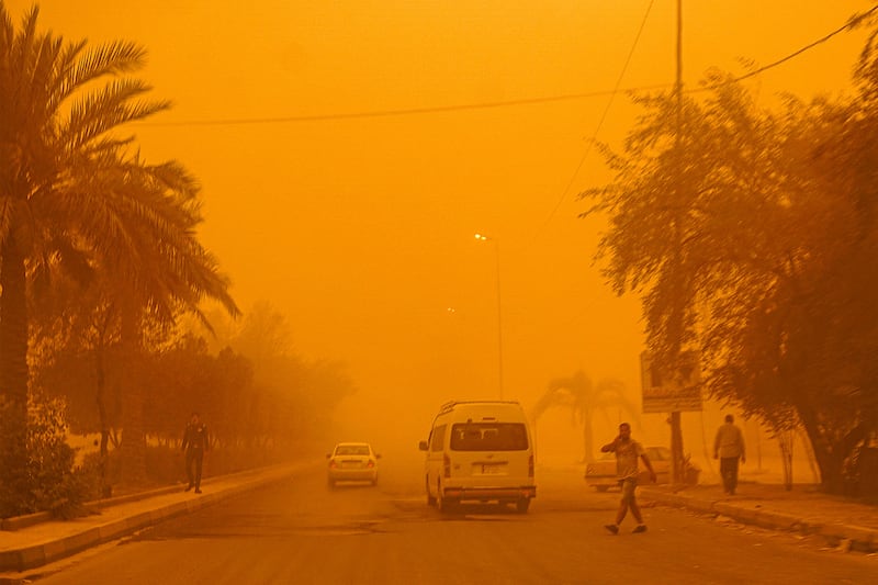 Dust fills the air in Baghdad. AFP