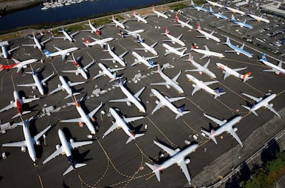 FILE PHOTO: Dozens of grounded Boeing 737 MAX aircraft are seen parked in an aerial photo at Boeing Field in Seattle, Washington, U.S. July 1, 2019. Picture taken July 1, 2019.  REUTERS/Lindsey Wasson/File Photo