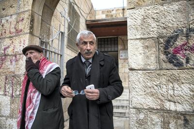 Jalal Barham (right) as he leaves the Arab Orthodox Cultural Center in the West Bank city of Beit Sahour near Bethlehem on January 18,2019 .When he heard the latest news about the Greek Orthodox patriarch of Jerusalem secretly selling and leasing land to Israelis, he said first he felt angry. And then he felt shame.


ÒI feel shame that our leadership is working like an agent to sell buildings and land,Ó said Barham, 65, who is a member of the Follow-up Committee of the Arab Orthodox High Council in Beit Sahour in the Israeli-occupied West Bank. ÒThey made it like just a business.Ó