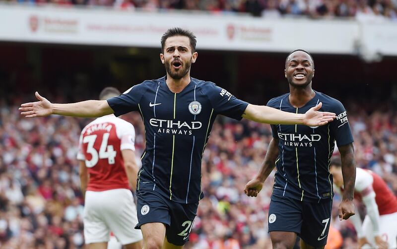 epa06946121 Manchester City's Bernardo Silva (L) celebrates after scoring during the English Premier League soccer match between Arsenal FC and Manchester City at the Emirates Stadium in London, Britain, 12 August 2018.  EPA/ANDY RAIN EDITORIAL USE ONLY. No use with unauthorized audio, video, data, fixture lists, club/league logos or 'live' services. Online in-match use limited to 75 images, no video emulation. No use in betting, games or single club/league/player publications.