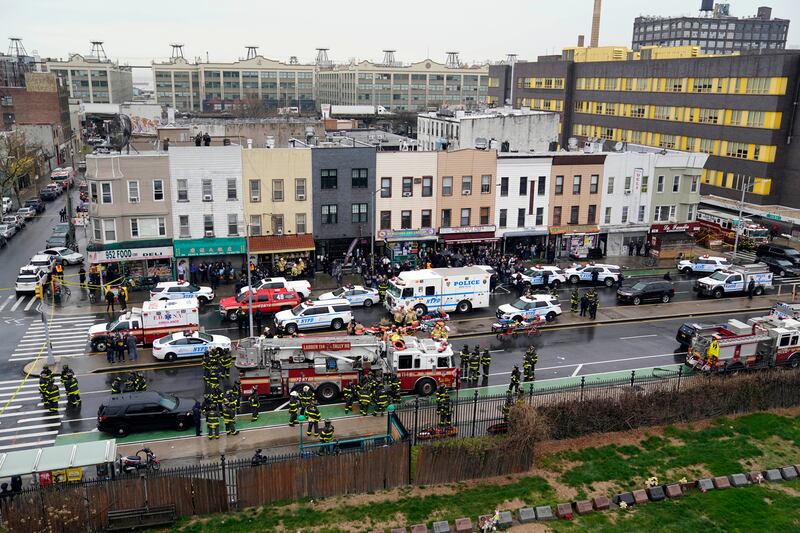 Emergency crews at the entrance to the 36th Street subway station in Brooklyn, after the rush-hour shooting on Tuesday. AP