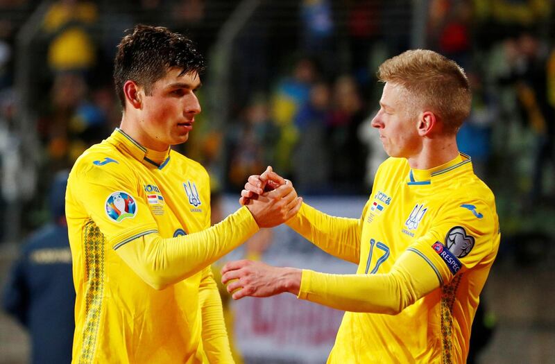 Oleksandr Zinchenko, right, was in action for the Ukraine against Portugal and Luxembourg. Reuters