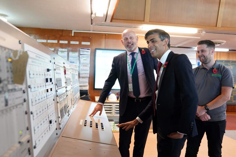 Britain's Prime Minister Rishi Sunak with National Gas chief executive Jon Butterworth during a visit to the Bacton Gas Terminal in Norfolk. AFP