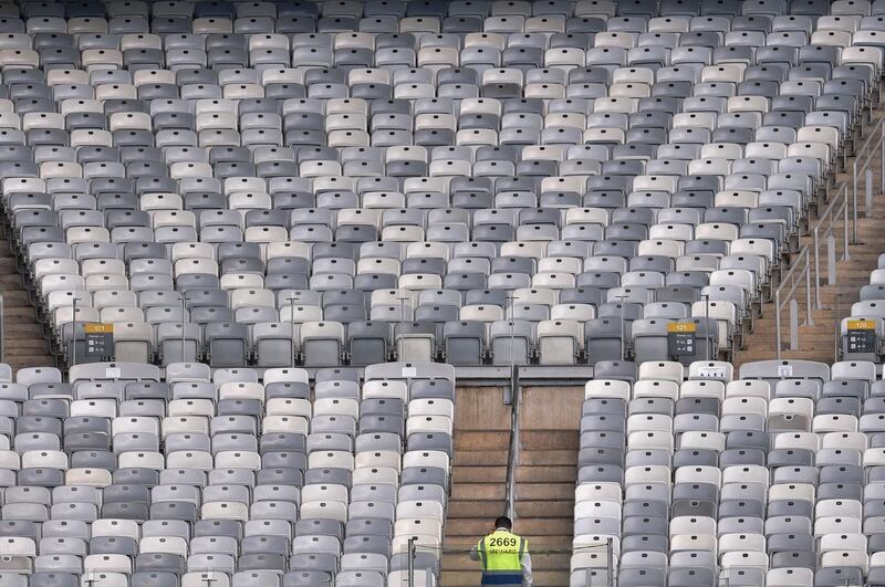 A steward waits for fans to arrive before the Copa America football tournament group match between Bolivia and Venezuela at the Mineirao Stadium in Belo Horizonte, Brazil. AFP
