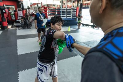 Boxing can be a great outlet for kids who are shy or feel anxious at school. Antonie Robertson / The National

