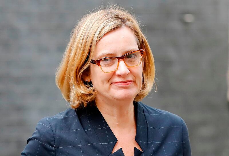 Britain's Home Secretary Amber Rudd arrives at 10 Downing Street in central London on April 25, 2018. / AFP PHOTO / Tolga AKMEN