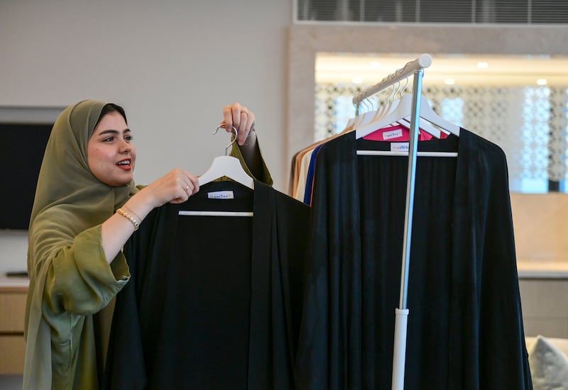 Zein Altawil with her line of sustainable abayas. Khushnum Bhandari / The National