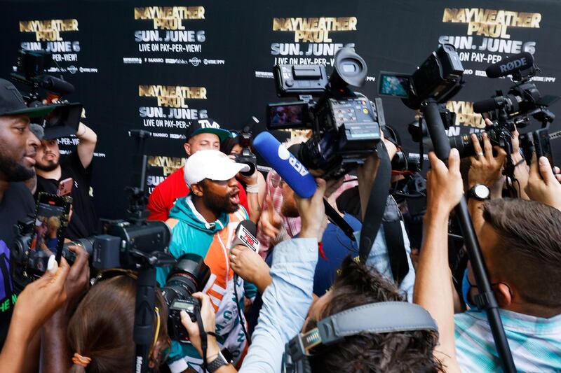 Floyd Mayweather is confronted by Jake Paul following a press conference at Hard Rock Stadium in Miami Gardens, Florida for Mayweather's exhibition bout against Logan Paul on June 6. AFP