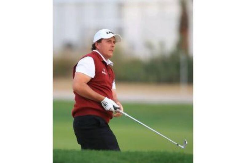 Phil Mickelson gets a feel for the National Course ahead of the Abu Dhabi Golf Championship. Mike Young / The National
