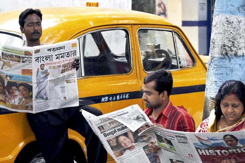 Indians can read their daily newspapers in many local languages. But as India becomes more homogenous, how long can India's multitude of languages last? Rajesh Kumar Singh / AP