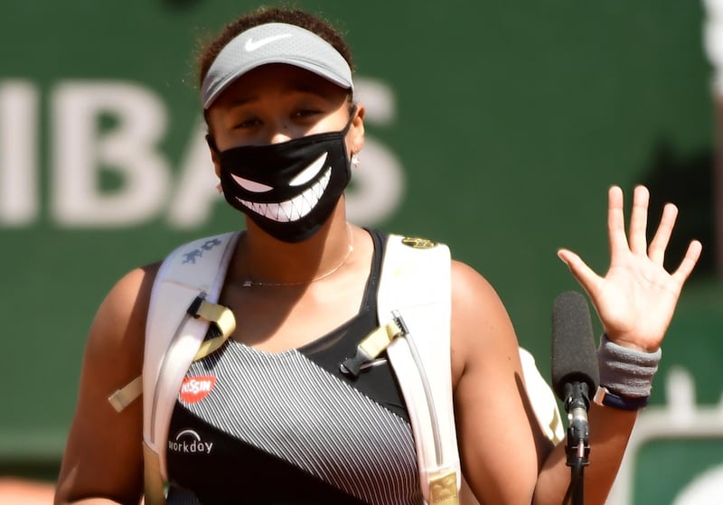 Naomi Osaka celebrates winning against Patricia Maria Tig of Romania during their first round match at the French Open. EPA