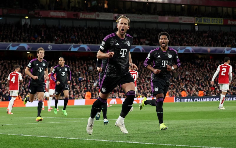 Harry Kane celebrates scoring Bayern Munich's second goal against Arsenal. Reuters