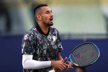 Nick Kyrgios complains to the umpire at Queen's. Alex Pantling / Getty Images