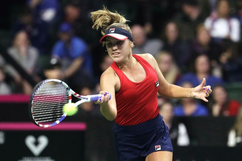 United States' Sofia Kenin hits a forehand to Latvia's Anastasija Sevastova during a Fed Cup qualifying tennis match Friday, Feb. 7, 2020, in Everett, Wash. (AP Photo/Elaine Thompson)