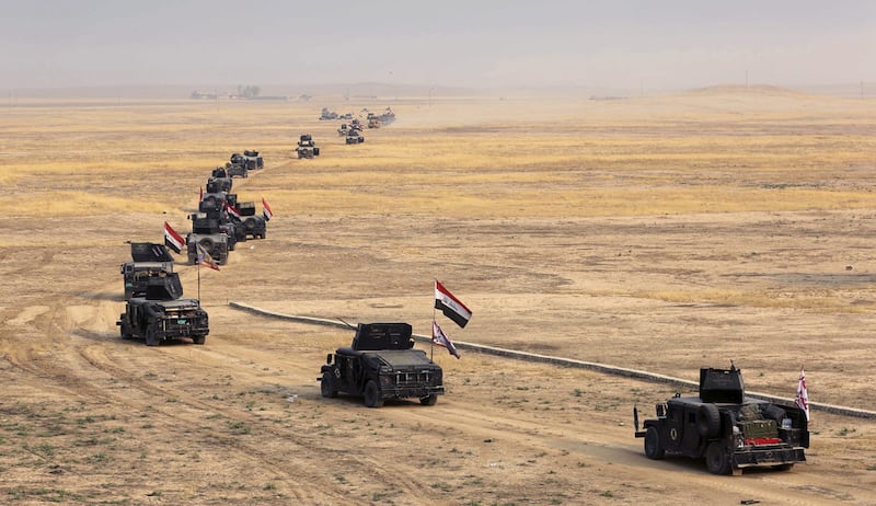 Iraqi forces prepare to attack ISIS positions in the village of Tob Zawa, in 2016. An operation against remnants of the extremist group is continuing. AP
