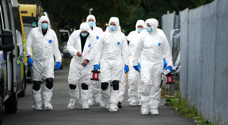 Forensic officers on Kingsheath Avenue in Knotty Ash. PA