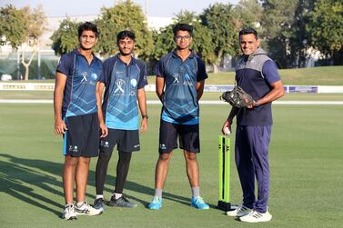 Left to Right – ICC academy U 19 players Jash Giyanani, Abhey Katoch, Nilansh Keswani and Qasim, Coach at the ICC academy in Dubai. Pawan Singh / The National  