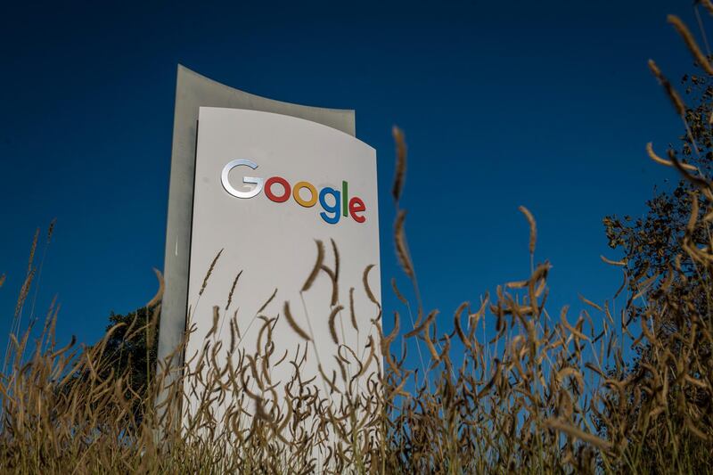 Signage is displayed in front of a building on the Google campus in Mountain View, California, U.S., on Wednesday, Oct. 21, 2020. The U.S. Justice Department sued Alphabet Inc.'s Google in the most significant antitrust case against an American company in two decades, kicking off what promises to be a volley of legal actions against the search giant for allegedly abusing its market power. Photographer: David Paul Morris/Bloomberg