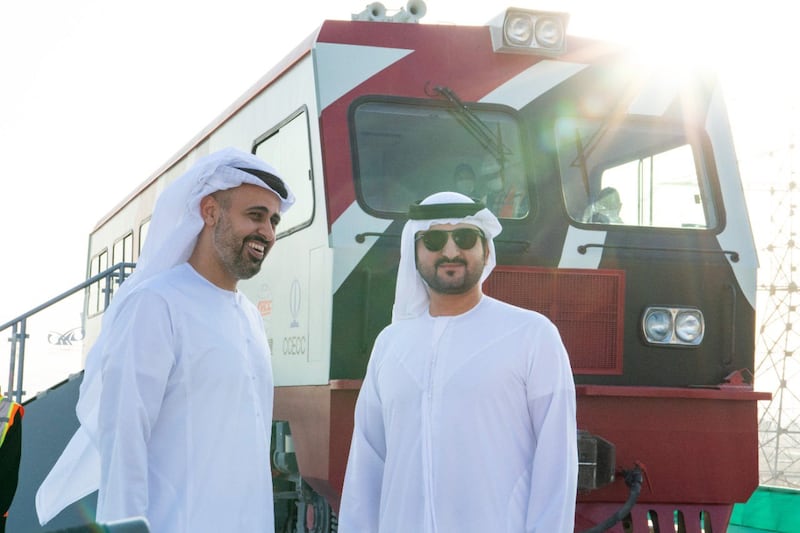 Sheikh Maktoum bin Mohammed with Sheikh Theyab bin Mohammed. The new rail line stretches for 256 kilometres and includes 29 bridges, 60 crossings and 137 drainage channels, Abu Dhabi Media Office said.