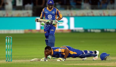 Dubai, 25, February, 2017: Kieron Pollard and Immad Wasim of Karachi Kings celebrates after winning their match against Lahore Qalanders during the 2nd round of  the PSL match at the  Dubai International Cricket Stadium in Dubai. ( Satish Kumar / The National ) 
ID No: 20630
Section: Sports
Reporter: Paul Radley *** Local Caption ***  SK-PSL-25022017-02.jpg