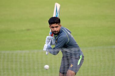 (FILES) In this file photo taken on September 11, 2021, Pakistan's captain Babar Azam attends a practice session at the Rawalpindi Cricket Stadium in Rawalpindi.  - Virat Kohli's India begin the Twenty20 World Cup as one of the favourites and take on arch-rivals Pakistan in Dubai on October 24, 2021.  (Photo by Farooq NAEEM  /  AFP)