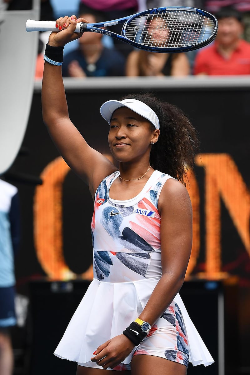 MELBOURNE, AUSTRALIA - JANUARY 22: Naomi Osaka of Japan shows appreciation to the crowd after winning her Women's Singles second round match against Saisai Zheng of China on day three of the 2020 Australian Open at Melbourne Park on January 22, 2020 in Melbourne, Australia. (Photo by Quinn Rooney/Getty Images)