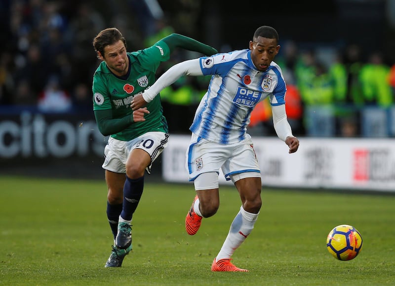 Right midfield: Rajiv van la Parra (Huddersfield) – Opened his Premier League account in spectacular style with a long-range goal to defeat West Bromwich Albion. Andrew Yates / Reuters