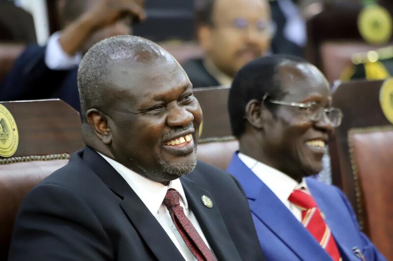 South Sudan's First Vice President Riek Machar and Second Vice President James Wani Igga, attend their swearing-in ceremony at the State House in Juba, South Sudan. Reuters