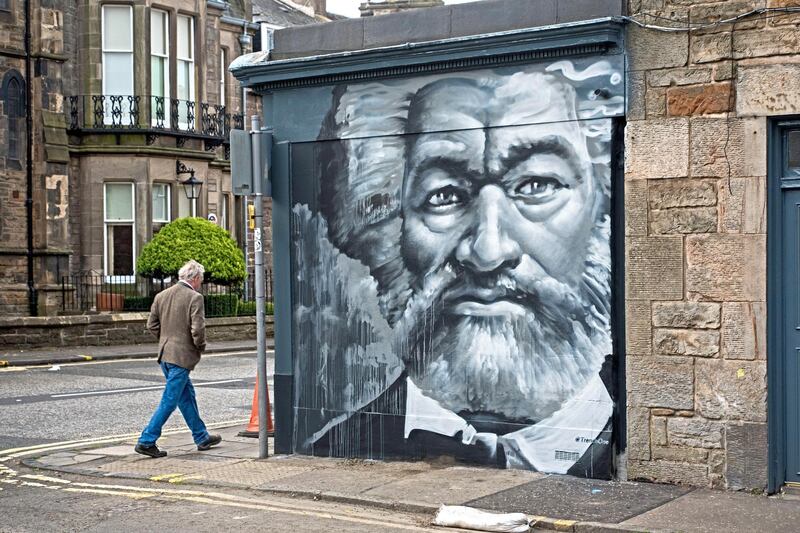 2CX0JXW Portrait of Frederick Douglass (1818-95),  an American social reformer, abolitionist and statesman by Ross Blair on a wall in Edinburgh.