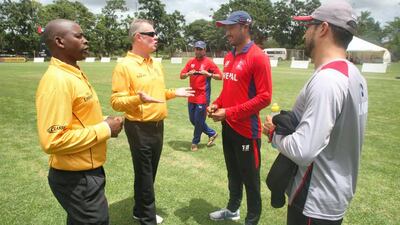 Nepal, in red, and the UAE saw their warm-up match affected by rain. ICC