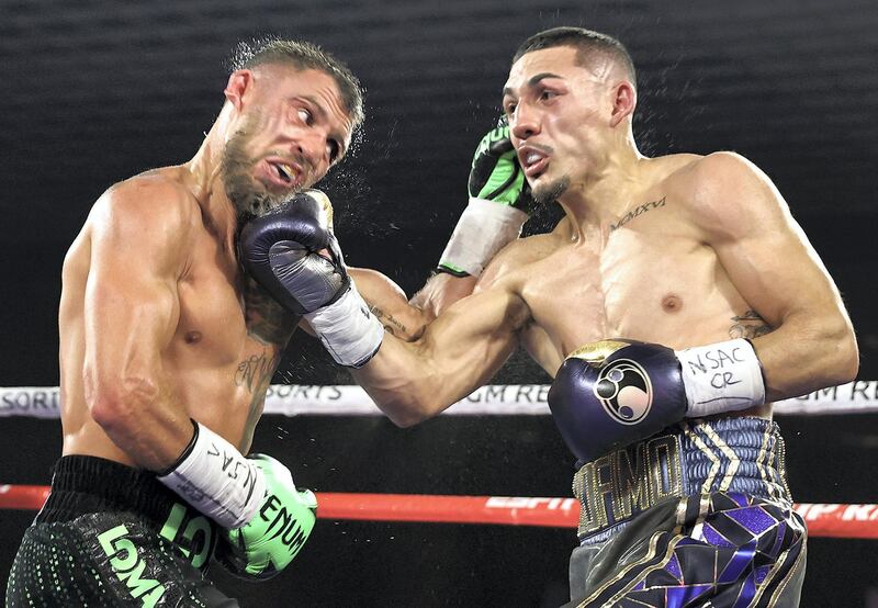 LAS VEGAS, NEVADA - OCTOBER 17: In this handout image provided by Top Rank, Vasiliy Lomachenko fights Teofimo Lopez Jr in their Lightweight World Title bout at MGM Grand Las Vegas Conference Center on October 17, 2020 in Las Vegas, Nevada. (Photo by Mikey Williams/Top Rank via Getty Images)