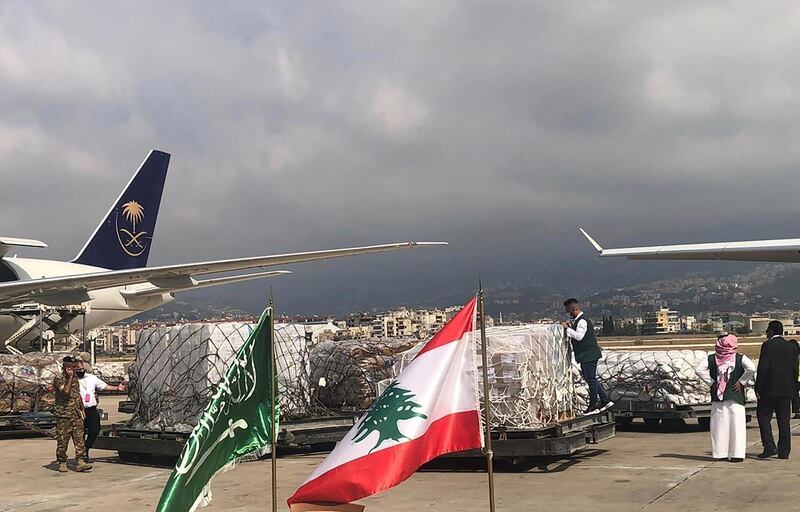 Staff members of King Salman Humanitarian Aid and Relief Centre unload humanitarian aid at Beirut International airport. Saudi Press Agency/Handout via Reuters