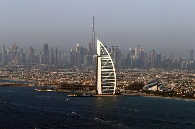 A view of the Burj Al Arab hotel and Burj Khalifa in Dubai, United Arab Emirates, June 9, 2021. Picture taken June 9, 2021. REUTERS/Christopher Pike