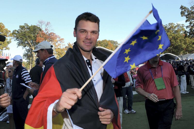 MEDINAH, IL - SEPTEMBER 30:  Martin Kaymer of Europe celebrates after he holed the decisive putt on the 18th green during the Singles Matches for The 39th Ryder Cup at Medinah Country Club on September 30, 2012 in Medinah, Illinois.  (Photo by Andrew Redington/Getty Images)