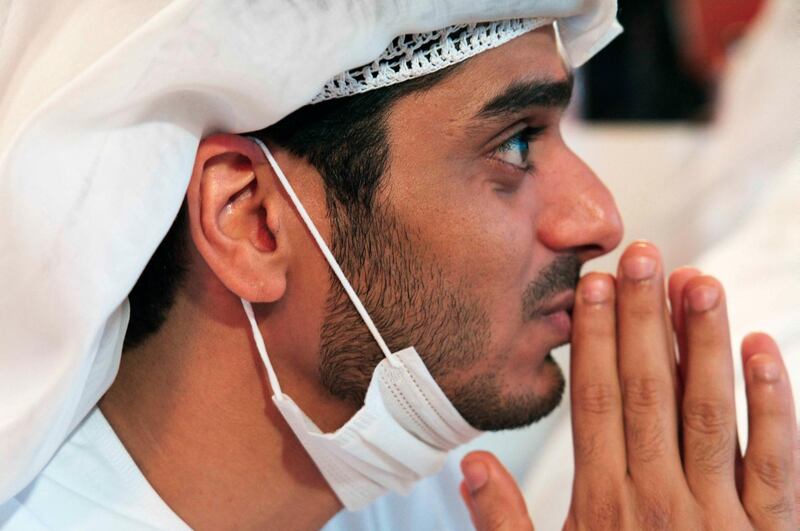 Mohammed al-Mannaee, an announcer with Dubai TV, reacts as he watches the launch of the "Amal" or "Hope" space probe at the Mohammed bin Rashid Space Center in Dubai, United Arab Emirates, Monday, July 20, 2020. A United Arab Emirates spacecraft, the "Amal" or "Hope" probe, blasted off to Mars from Japan early Monday, starting the Arab world's first interplanetary trip. (AP Photo/Jon Gambrell)