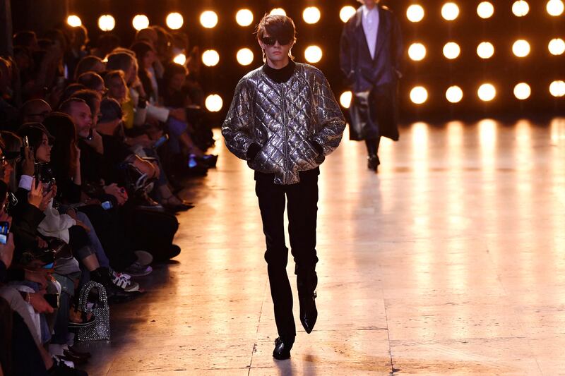 Bright jackets on the catwalk. AFP