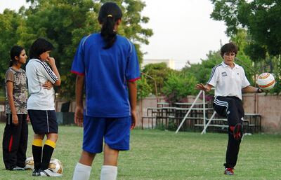 Monika Staab coaching Pakistani female footballers during training in Karachi in 2007. AFP