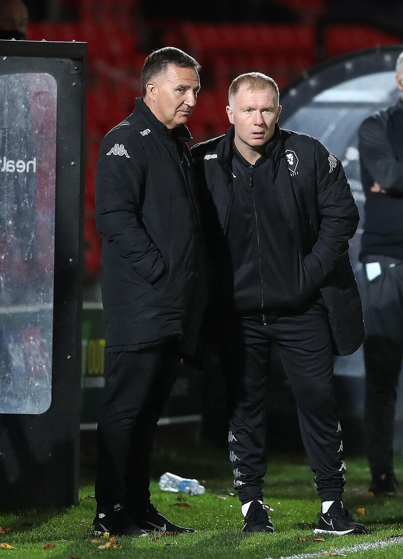 Paul Scholes talks with assistant manager Warren Joyce during the Southend game. PA