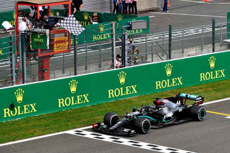 Mercedes' driver Lewis Hamilton crosses the finish line to win at the Spa-Francorchamps circuit. AFP